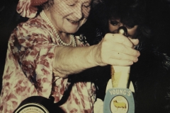 Queen mum - pulling a pint in a Young's Pub